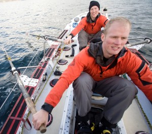 201001ROW-3007 Adam Two rowers rowing while two rowers sleeping